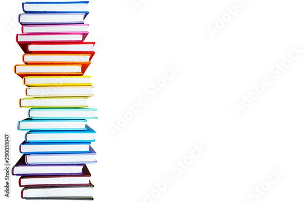 Obraz Books with Colorful Book Covers Stacked in a Pile, Isolated on White Background. Bright Education or Business Template with Copy Space
