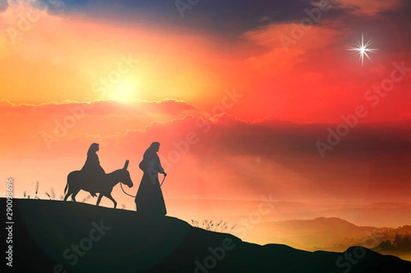 Obraz Christmas religious nativity concept: Silhouette pregnant Mary and Joseph with a donkey on star of cross background	