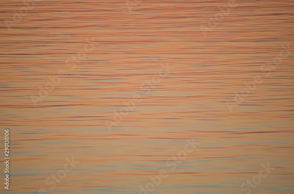 Fototapeta sunset over water surface