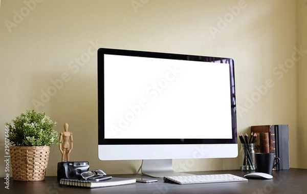 Fototapeta Workspace desk and laptop. copy space and blank screen. Business image, Blank screen laptop and supplies.