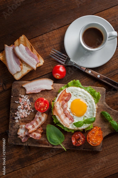 Obraz Fried eggs with bacon and vegetables