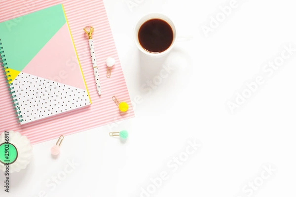 Obraz Flat lay desk table. Workspace with modern notebook and cup of coffee on white table. Copy space, top view