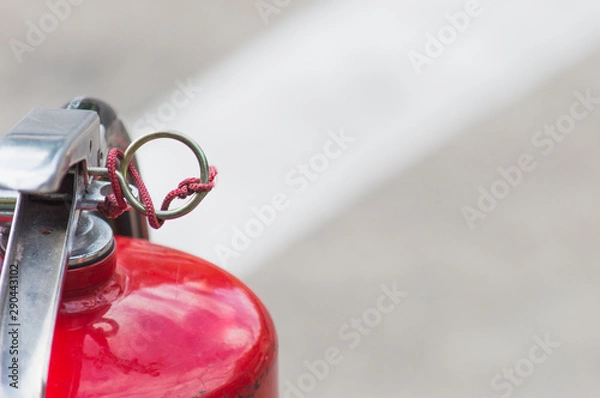 Fototapeta red extinguisher ready to use