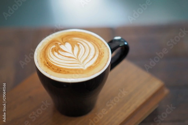 Fototapeta The latte coffee in the morning refreshes and wakes people up to create something great.
