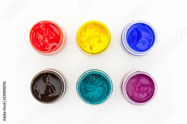Obraz Set of gouache paint pots of different colors top view on isolated white background