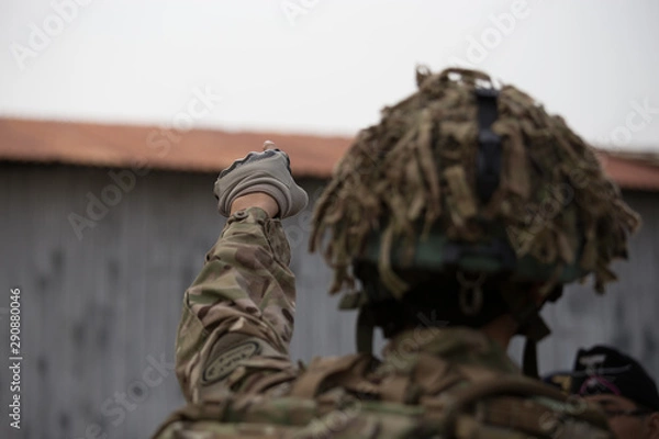 Obraz World War II, the worrier scene of the Entente Powers or Allies and Axis. The scene and arms in World War 2. Soldier pointing finger to sky or target