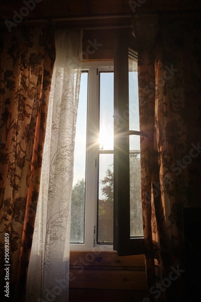 Fototapeta open window on a hot sunny day.