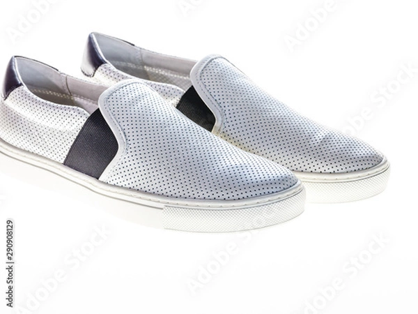 Fototapeta White shoes on the white background