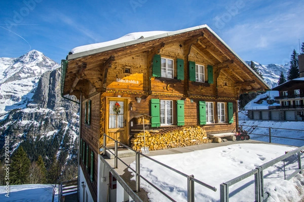 Fototapeta Walking around (Mürren) village In Switzerland ,this little village located up in the Swiss Alps in the Jungfrau ridge at 1400 meters high. this place offers a spectacular view of the mountains. 