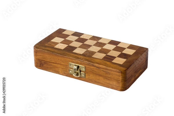 Fototapeta closed chessboard with wooden drawing  closeup isolated on white background