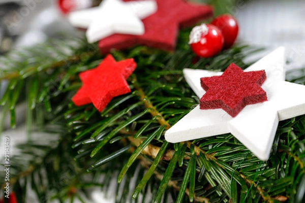 Fototapeta Decoration of handmade red and white advent christmas wreath from fir