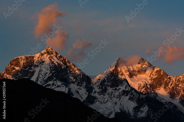 Obraz Snoy mountains during sunset