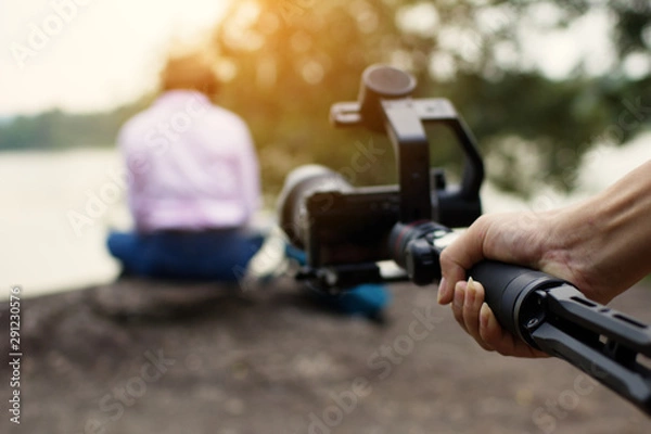 Obraz Camera with gimbal for video shooting.