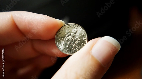 Obraz Hand hold one dime coin close up