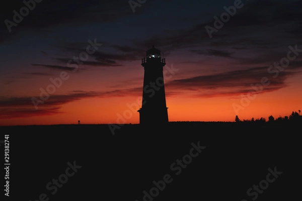 Obraz lighthouse at sunset