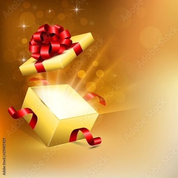 Fototapeta Opened gift box with bright rays of light