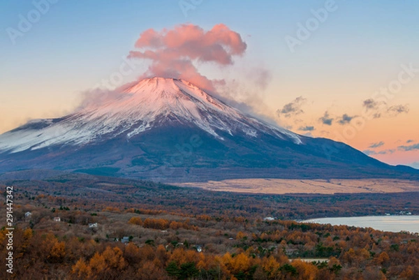 Fototapeta Fuji mountain with red reflective clouds covered the summit in early morning at Panorama-dai , lake Yamanakako.