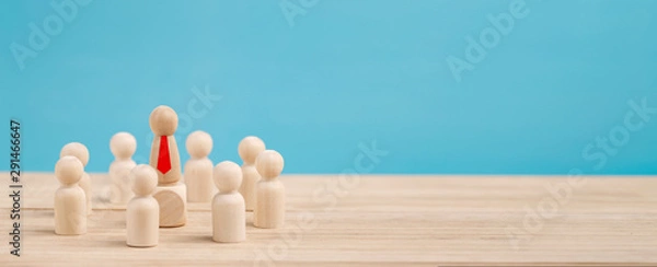 Fototapeta Successful businessman standing out from the crowd. Concept is the  leadership and team victory in business.