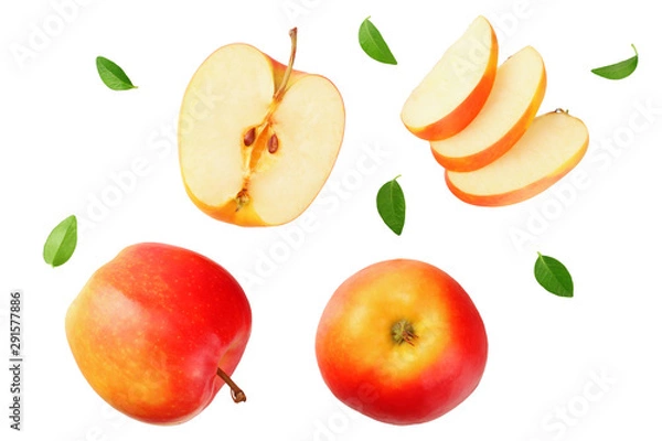 Fototapeta red apples with slices and green leaves isolated on a white background. top view