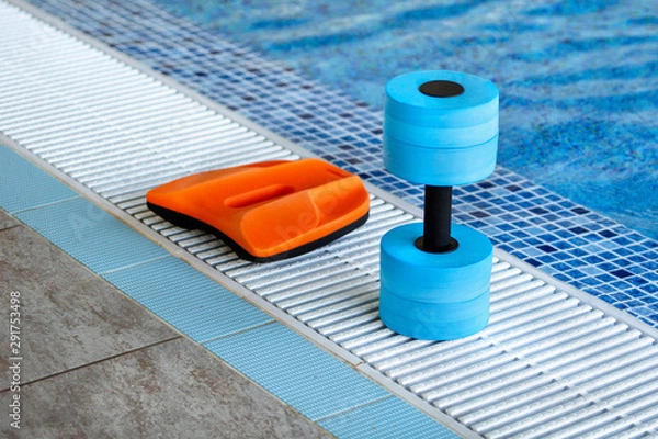 Obraz Swimming pool. Accessories for swimming. Board and dumbbell