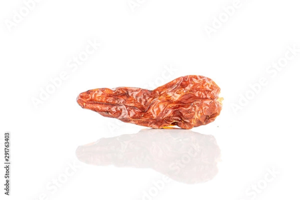Fototapeta One whole hot dry red chili pepper peperoncino isolated on white background