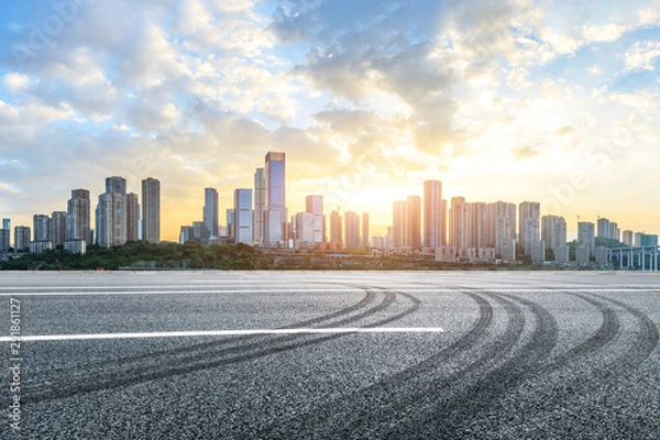 Fototapeta Empty asphalt road and Chongqing cityscape at sunset