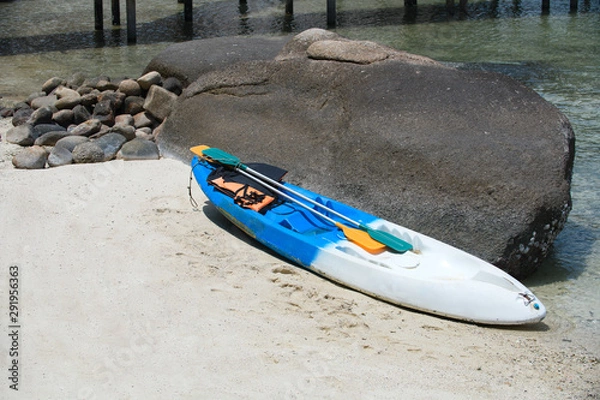 Obraz Canoes on a white sand beach