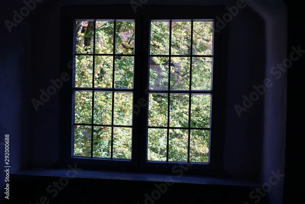 Fototapeta Windows photographed from the inside have always served people useful to bring light and fresh air inside the building