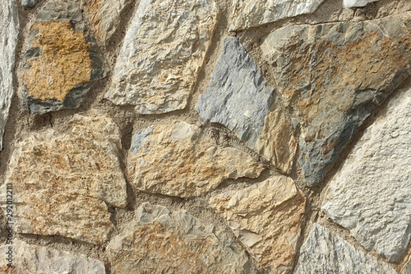 Obraz A stone wall of raw stone. Texture of stone. Stone wall.