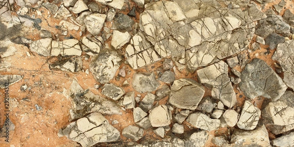 Fototapeta Stone. Texture of colorful Mediterranean stone on the shore