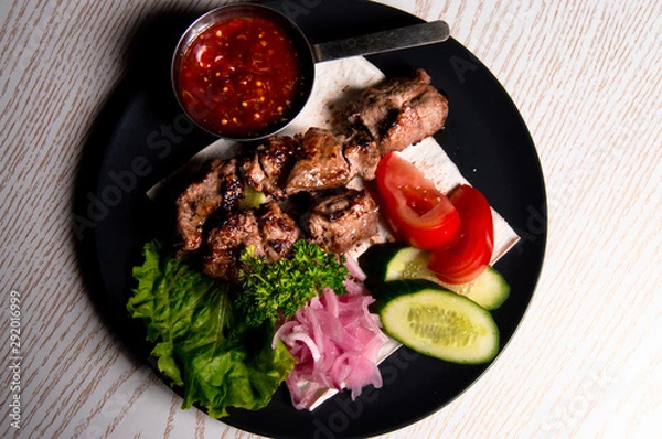 Obraz beef meat on a plate of vegetables