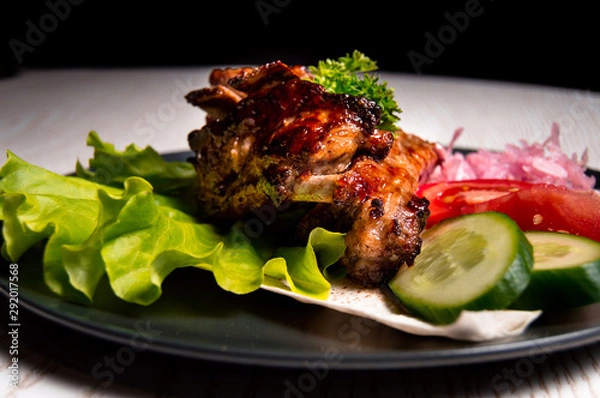 Obraz meat chicken dish on a plate for the menu