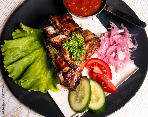 Obraz meat chicken dish on a plate for the menu