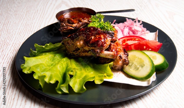 Obraz meat chicken dish on a plate for the menu
