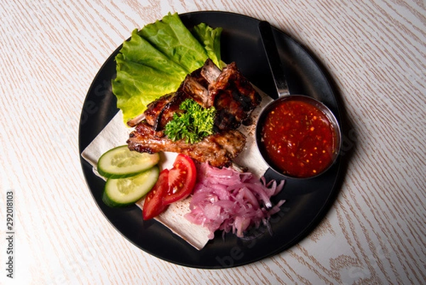 Obraz meat chicken dish on a plate for the menu