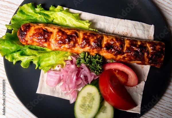 Obraz meat chicken dish on a plate for the menu