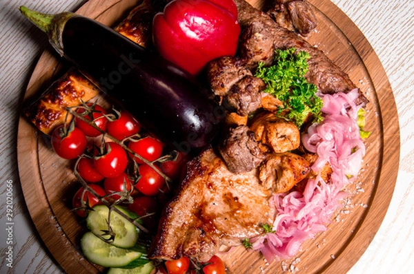 Obraz meat plate with vegetables and herbs
