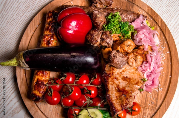 Obraz meat plate with vegetables and herbs