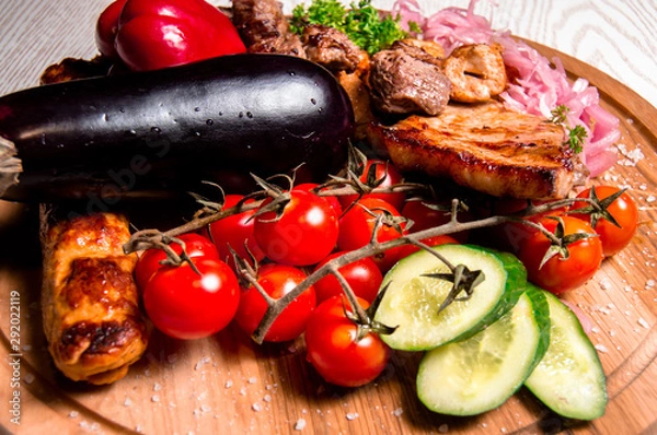 Obraz meat plate with vegetables and herbs