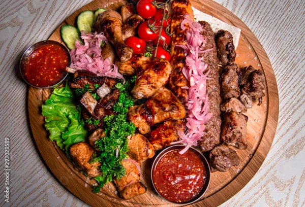 Obraz meat plate with vegetables and herbs