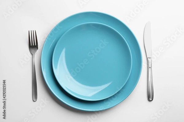 Fototapeta Elegant table setting on white background, top view