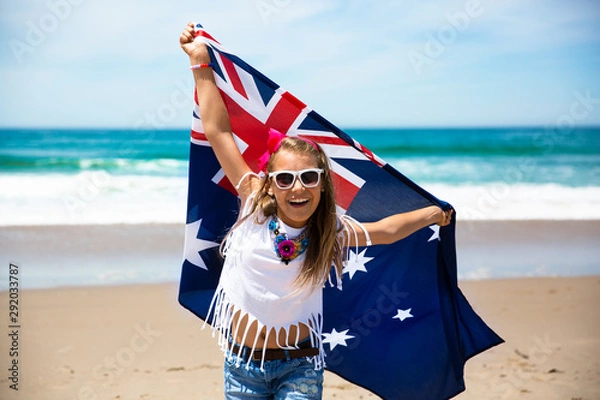 Obraz Little girl raises hands with Australian flag celebrating Australia Day	