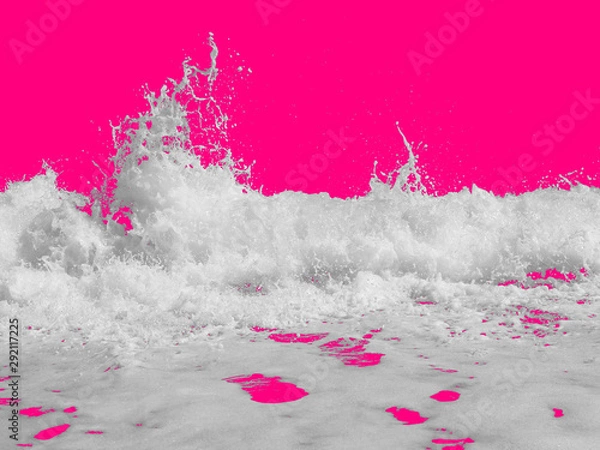 Fototapeta white sea foam from the surf, isolated on a bright pink background