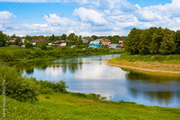 Fototapeta View on river and district with old wooden houses in Vologda. Russia