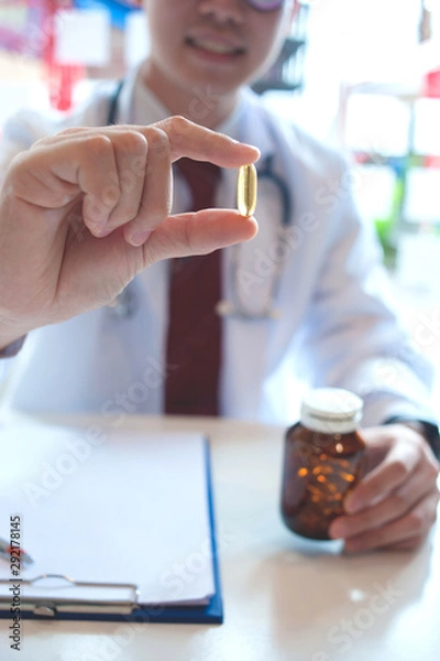 Obraz Fish Oil Omega 3 in the doctor's hand.