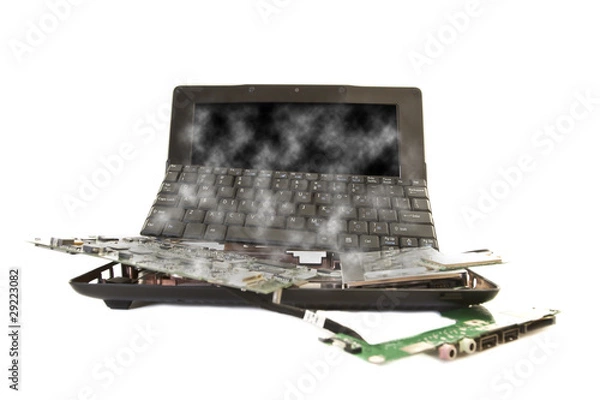 Fototapeta damaged computer broken into parts