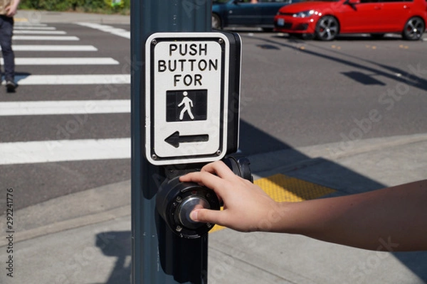 Fototapeta A pedestrian light switch with voice guidance and comprehensive operating instructions. Pedestrian presses the button.