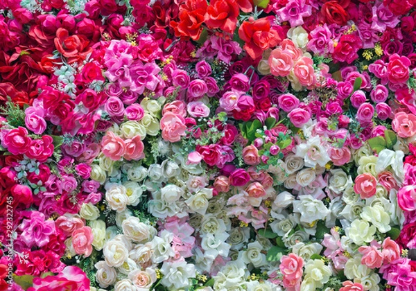 Fototapeta Colorful artificial roses for the background.