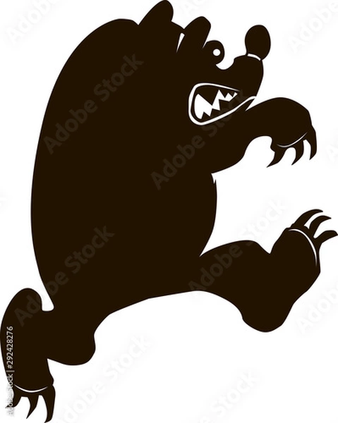 Fototapeta  silhouette of an attacking bear from the forest