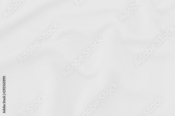 Fototapeta White fabric texture background with soft waves.
